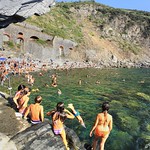 The Italian youngsters swimming and diving into the ligurian sea