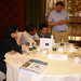 Commercial Fundamentals of the Upstream Oil & Gas Industry - Trainer with Delegates at Brainstorming Session