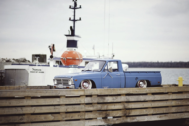 show old ontario canada ford vintage fun cool nikon rust whitewalls dof photoshoot bokeh low small 14 85mm pickup manitoulin fullframe nikkor fx sparks courier 74 85 lowered minitruck bluetruck bagged farmtruck 85mm14d airbagged vintagetones oldfordpickup d700 layingframe 1974fordcourier droppedanddestroyed baggedfordcourier noshineaward