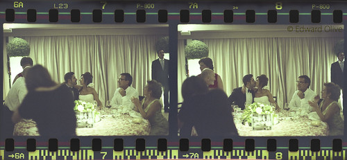 Negatives 7 & 8 - Bride & groom, parents, table, curtains, roof at slanted angle, assorted other guests & waiters