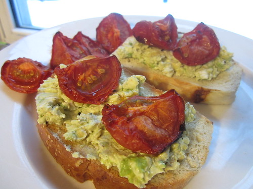 Goat cheese and avocado bruschetta with slow roasted tomatoes