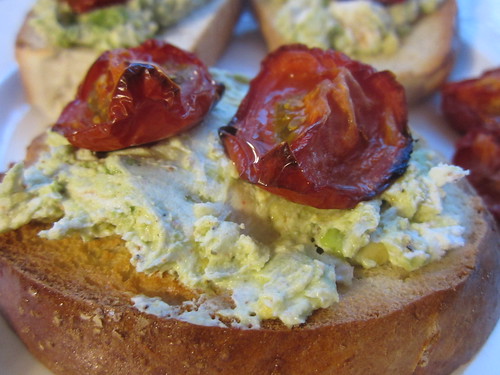 Goat cheese and avocado bruschetta with slow roasted tomatoes