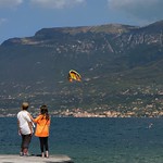 Mother and daughter enjoying impressive Lago di Garda