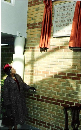 Her Majesty The Queen unveils a commemorative plaque at the opening of the new microbiology building in 1992