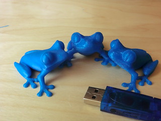 3D printed blue treefrogs in different layer t...