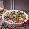 Toasted chickpeas, grape tomatoes, cucumber & cilantro over rice noodles w/ lime juice, soy & sriracha sauces