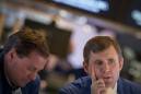 Wall Street drops after Swiss move; banks tumble