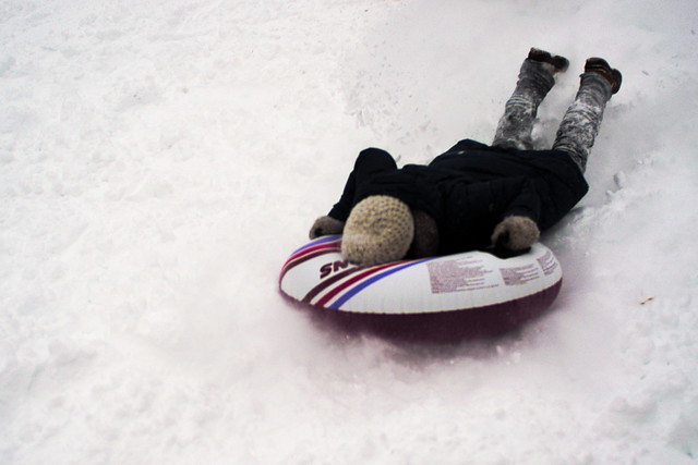 27/01/15 - Medford/Somerville, MA - A student faceplants as they sled down Presidents Lawn during Winter Storm Juno