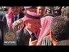 King Abdullah arrives in murdered pilots hometown