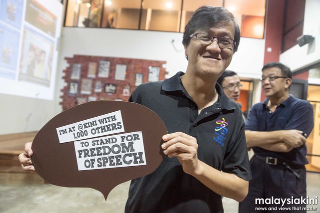 Suara Rakyat Malaysia (Suaram) executive director, Yap Swee Seng stand together with MALAYSIAKINI for freedom of speech.