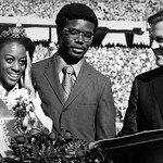 Homecoming Queen Mary Evelyn Porterfield with escort Michael Brown and Alumni Affairs director Bryce Younts; 1970