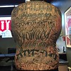 just finished up on this full back piece of script on a good friend will aka dj tango. i started the top of this just over 4 years ago when i first started tattooing and over the last few months have added the bottom half. its not often i look back at m
