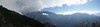 A panorama on descent from the Pangkongma La, with Mera just peeping out through cloud on the left.