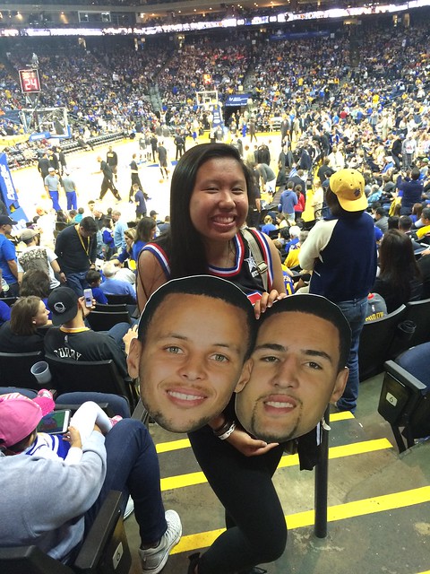Fan shows off her STEPHEN CURRY Big Head at the Golden State Warriors Game