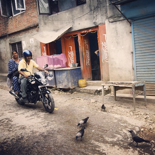   2009        ... #Travel #Memories #2009 #Kathmandu #Normal #Life #Couple #Bike #Peoples #Crows #Street #PrayForNepal ©  Jude Lee