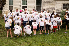 Cersovskis and Spinks Family Reunion at their Century Farm* in Harrisburg, Oregon, 2013. A small group of Cersovskis and Spinks in front of the 1860s farmhouse showing off their 'Getting it done for 100 years' t-shirts.