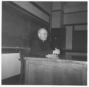 Photos of Monsignor Charles Diviney (01) - Monsignor Charles Diviney speaks to a class (1957)