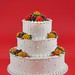 Beautiful roses, Swiss dots and pearls make up this uniquely designed cake.  Choose your special color roses using the color index.