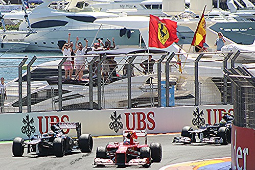 Fernando Alonso celebrates after winning the 2012 European Grand Prix in Valencia