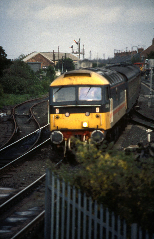 1987-06-12 #2/6 @ Seaham: 2M47 1805 Middlesbrough-Carlisle: Class 47 no. 47406 Rail Riders [slide 1003]<br/>© <a href="https://flickr.com/people/66289212@N07" target="_blank" rel="nofollow">66289212@N07</a> (<a href="https://flickr.com/photo.gne?id=8125897860" target="_blank" rel="nofollow">Flickr</a>)