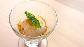 Pear and caramel gelato topped with fried basil
