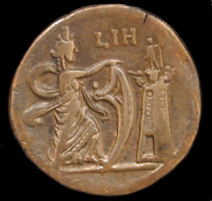 Monnaie ancienne avec le phare d'Alexandrie (Egypte)