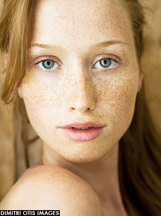 Natural beauty portrait of young model with freckles, close-up. http://www.dimitri.co.uk/beauty.html