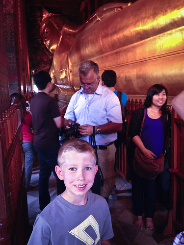 Kai poses with the reclining Buddha. • <a style="font-size:0.8em;" href="http://www.flickr.com/photos/96277117@N00/8643500753/" target="_blank">View on Flickr</a>