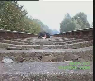 Man Under Moving Train