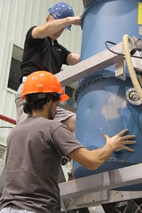 Wrestling the cryostat into place • <a style="font-size:0.8em;" href="http://www.flickr.com/photos/27717602@N03/7567950842/" target="_blank">View on Flickr</a>
