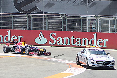Sebastian Vettel follows the safety car in his Red Bull Racing F1 car during the 2012 European Grand Prix in Valencia
