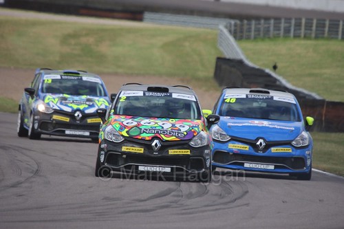 Chris Smiley leads Lee Pattison at Rockingham during the Clio Cup, August 2016