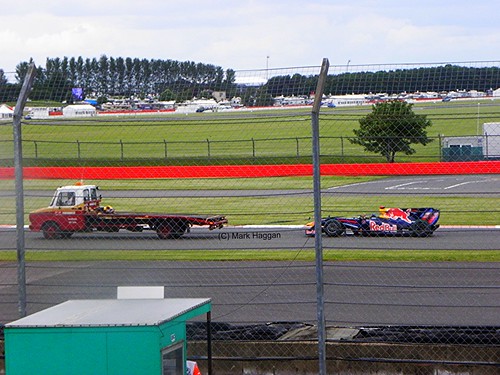 Mark Webber's Red Bull is rescued after Friday's second free practice session at the 2009 British Grand Prix