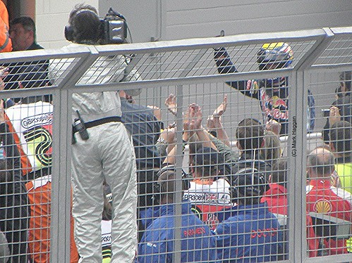 Sebastian Vettel gets out of his car after winning the 2009 British Grand Prix