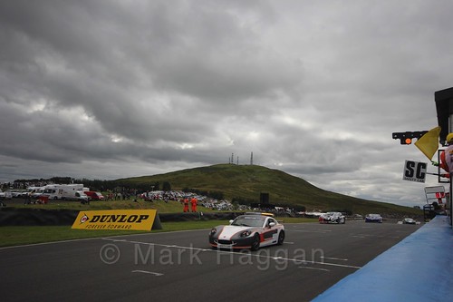 The safety car leads the pack in the Ginetta GT4 Supercup during the BTCC Knockhill Weekend 2016