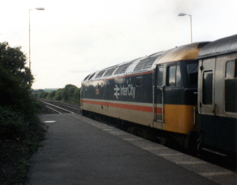 1987-06-12 #4/6 @ Seaham: 2M47 1805 Middlesbrough-Carlisle: Class 47 no. 47406 Rail Riders [Instamatic print]<br/>© <a href="https://flickr.com/people/66289212@N07" target="_blank" rel="nofollow">66289212@N07</a> (<a href="https://flickr.com/photo.gne?id=8125884466" target="_blank" rel="nofollow">Flickr</a>)