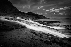 Scavaig River flowing into Loch Scavaig in Isle of Skye - B&W • <a style="font-size:0.8em;" href="https://www.flickr.com/photos/21540187@N07/8614804644/" target="_blank">View on Flickr</a>