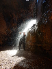 Fred getting a fresh-water shower in Travertine Canyon