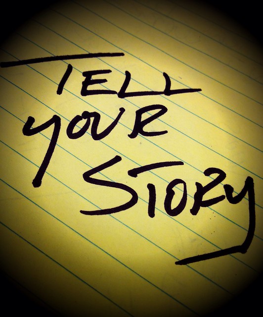 tell your story scribbled in pad