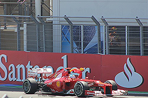 Fernando Alonso celebrates after winning the 2012 European Grand Prix in Valencia
