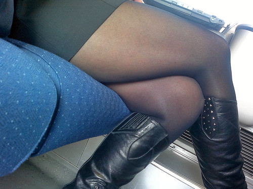 Mature legs on train