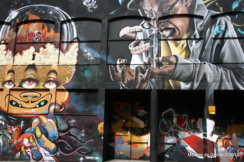 Graffiti by Mr Wany (Left) and Smug One (Right)