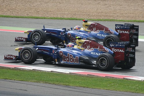 Red Bull Racing Drivers Mark Webber and Sebastian Vettel celebrate after the 2012 British Grand Prix at Silverstone