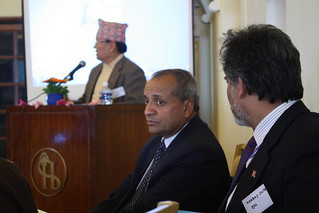 The audience enjoys a presentation from Dr. Kedar Baral by 