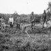 New settlers at a digging bee in Abitibi, Quebec, 1934 / De nouveaux colons se réunissent pour une corvée de creusage en Abitibi (Québec) en 1934