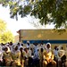 Students of the Niani Upper and Senior Secondary School eagerly wainting