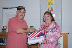 Susan Kincade accepts American Flag