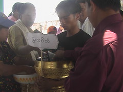 Monks Receiving Offerings at Full Moon Festival