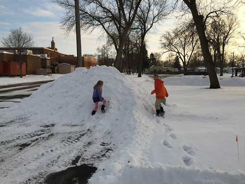 Kai and Nora attempt an impromptu scaling of snow hill outside grandma's home • <a style="font-size:0.8em;" href="http://www.flickr.com/photos/96277117@N00/16137247702/" target="_blank">View on Flickr</a>