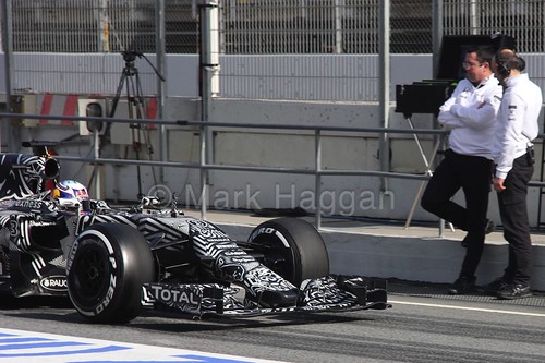 Eric Boullier watches Daniel Ricciardo in his Red Bull in Formula One Winter Testing 2015